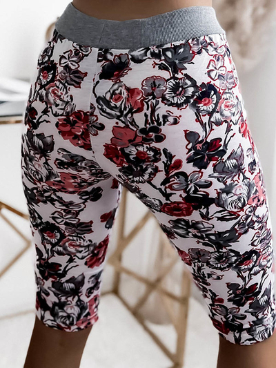 Naiste valged ja lillelised 3/4 lühikesed püksid PLUSS SUURUS - Riietus