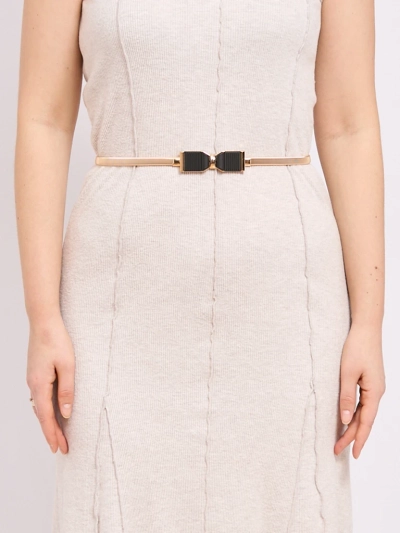 Golden women's Livia belt with a metal bow buckle in the Romano style