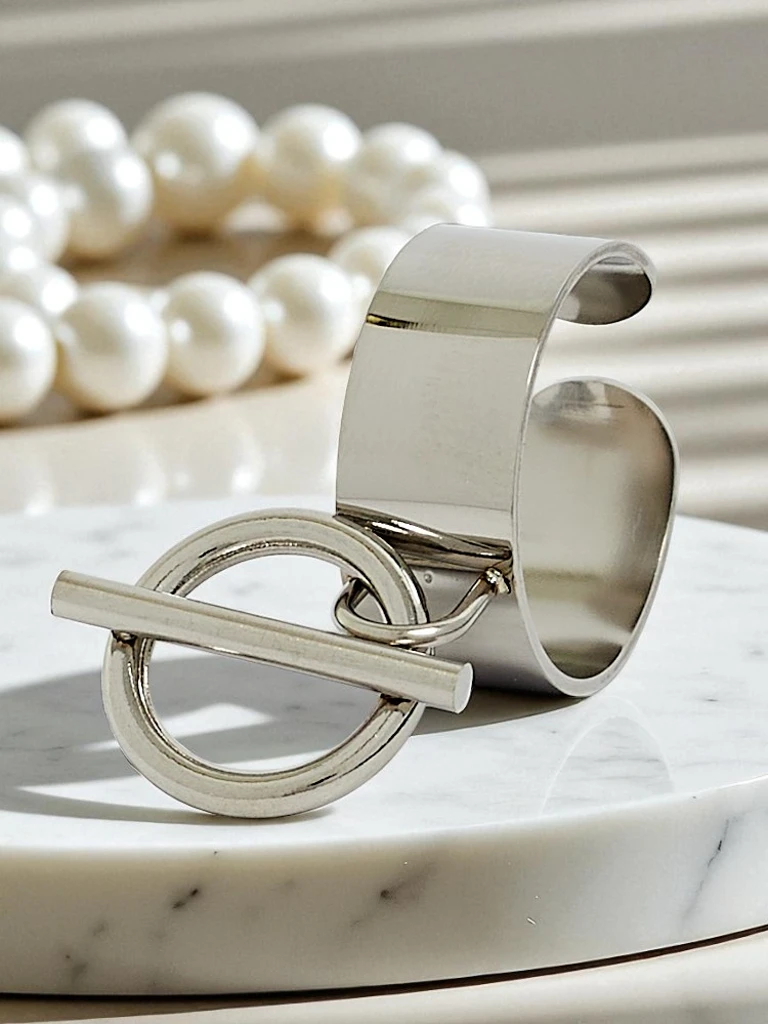 Dolce Vita bangle bracelet with decorative charms