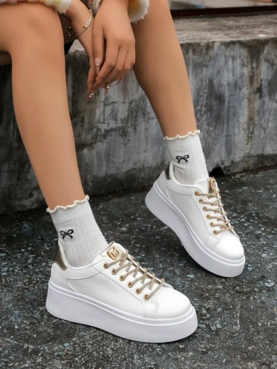 Royalfashion Naiste sportlikud sneakerid dekoratiivsete paeltega Eone