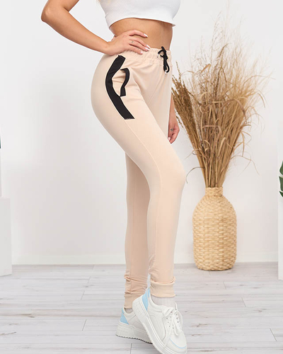 Ladies' beige sweatpants with inserts- Clothing