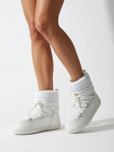 Naiste kasukaga saapad Uvella