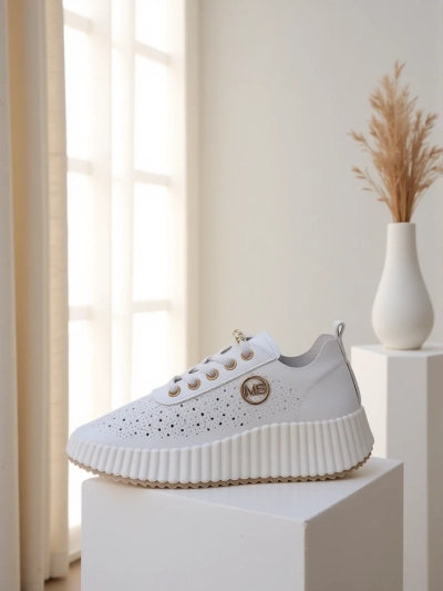 Royalfashion Naiste perforatsiooniga sportlikud sneaks Jovenes