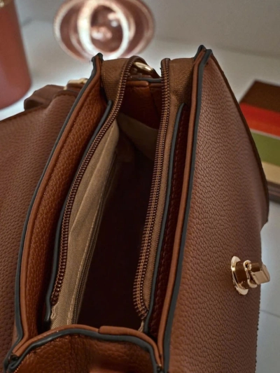 Camelia öko-naha ja seemisnahast käekott