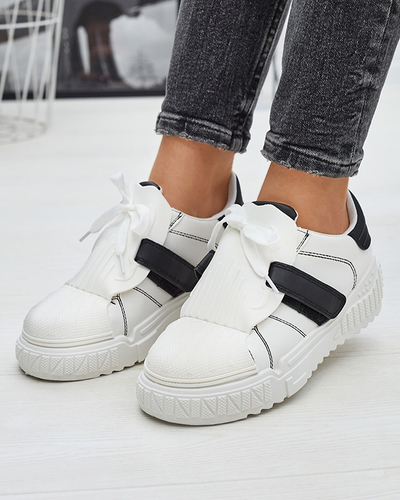 Mustad ja valged naiste spordijalatsid kummist sisetaldadega Inika - Jalatsid