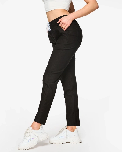 Naiste sirged musta värvi riidest püksid PLUS SIZE- Rõivad