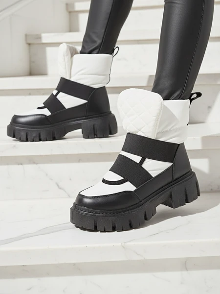 Women's snow boots on a flat sole in black and white Ferory- Footwear