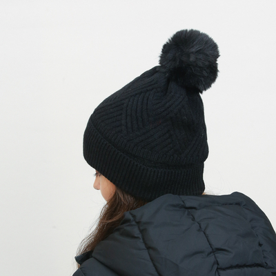 Black women's insulated beanie with pompom - Accessories