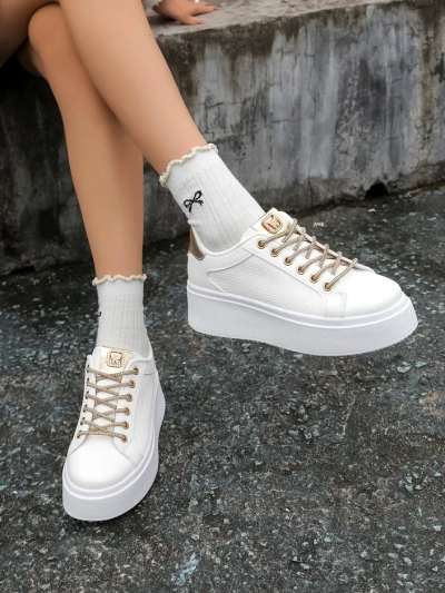 Royalfashion Naiste sportlikud sneakerid dekoratiivsete paeltega Eone