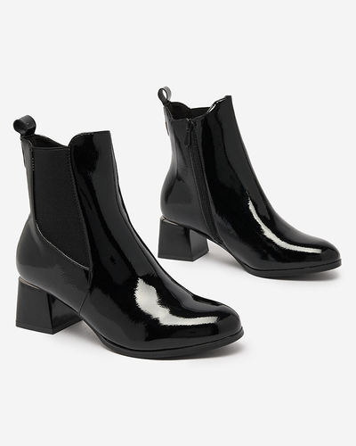 Royalfashion Black women's boots on a low post Nekery