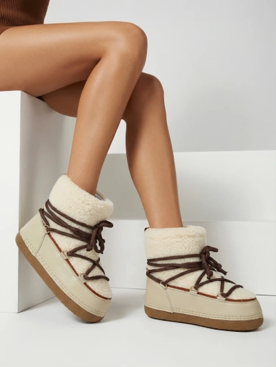 Naiste kasukaga saapad Uvella