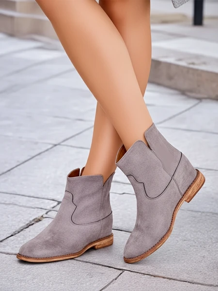 Royalfashion Kowboy-style ankle boots on a covered wedge Bluestone