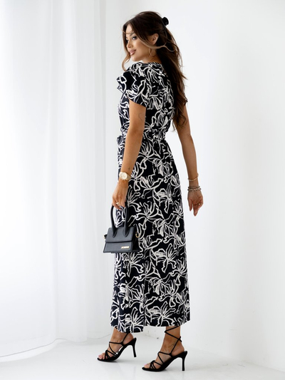 Royalfashion Patterned women's midi dress with short sleeves, wrap neckline, and belt