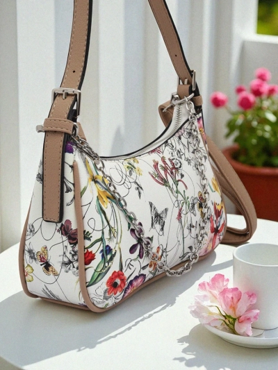 Royalfashion Small women's handbag made of eco-leather with floral pattern Lily Bloom