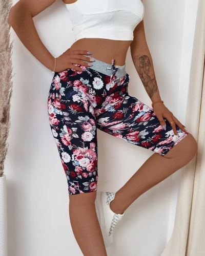 Naiste kastanpruunid 3/4 lillemustriga lühikesed püksid - Riietus