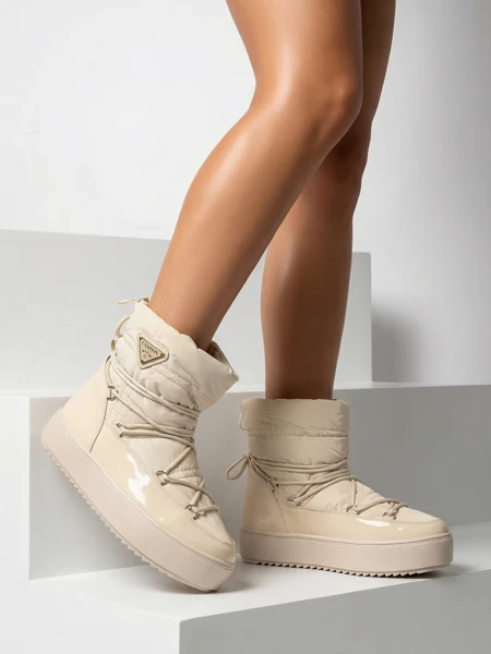 Royalfashion Женские сапоги-слипы a'la snow boots бежевого цвета Vevnose