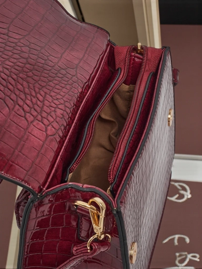 Lakitud väike naiste ökonahast käekott Veluna