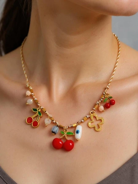 Atena Charm Cherry kaelakee – kuldsed kirsiamuletid