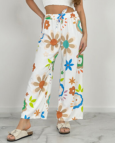 Royalfashion Naiste laiad lillemustrilised riidest püksid