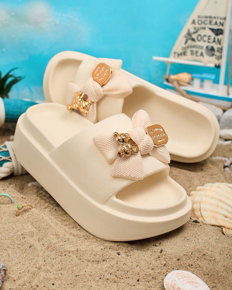 Royalfashion Naiste kummist flip-flopid dekoratiivse vibuga Nilm