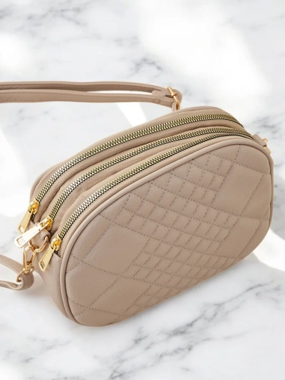 Royalfashion Oval small women's handbag made of eco-leather
