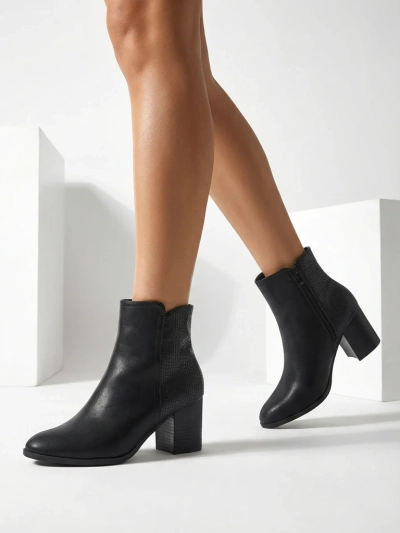Royalfashion Women's ankle boots on a post Abinom