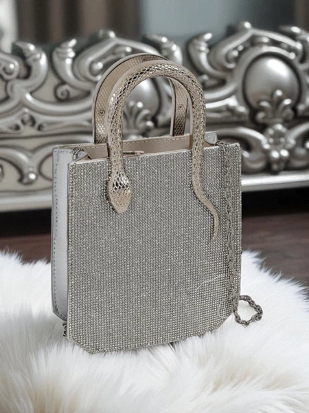 Royalfashion Naiste tsirkoonide ja madu käepidemetega käekott Snake Glam