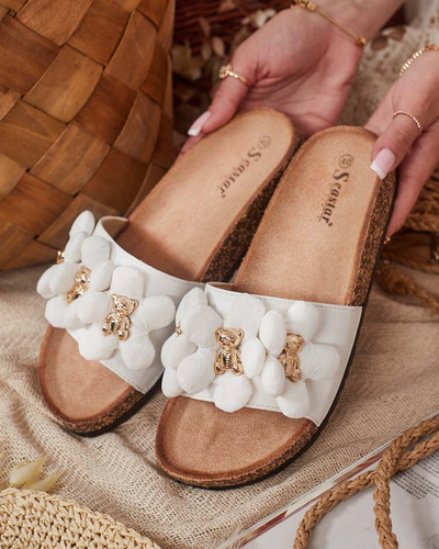 Royalfashion Naiste flip-flops kuldsete karude ja lilledega Isaralle