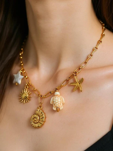 Athena Charm Sea Necklace – Golden Amulets with Marine Motifs