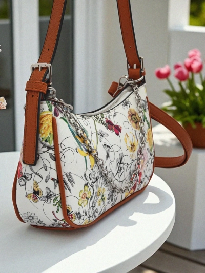 Royalfashion Small women's handbag made of eco-leather with floral pattern Lily Bloom