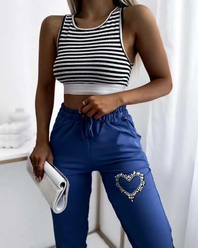 Women's blue sweatpants with zirconia embellishment- Clothing