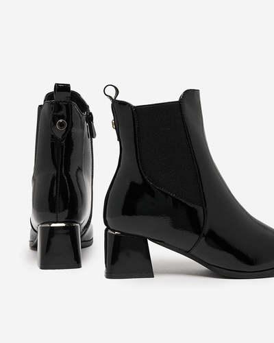 Royalfashion Black women's boots on a low post Nekery