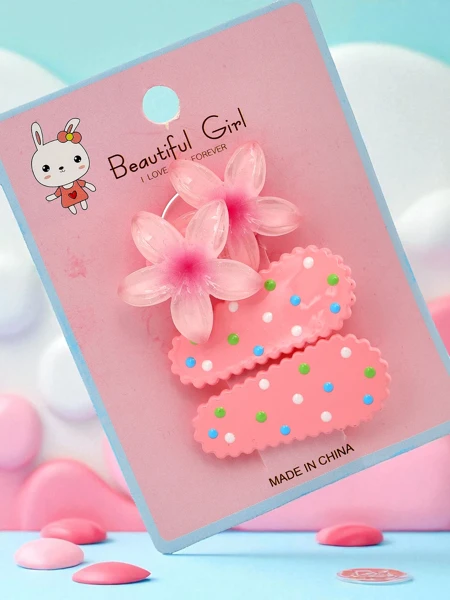 Juukseklambrite komplekt lillemotiiviga