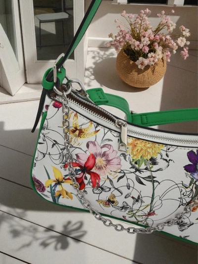 Royalfashion Small women's handbag made of eco-leather with floral pattern Lily Bloom