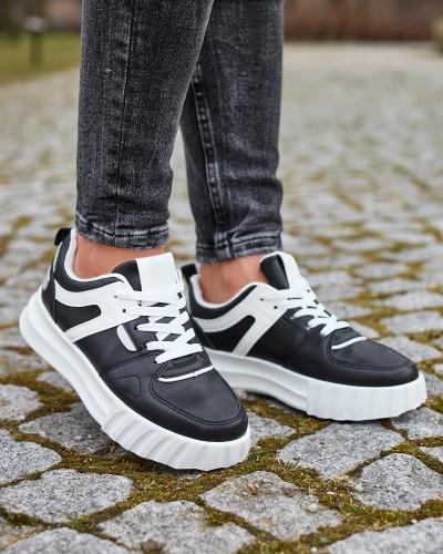 Öko-nahast naiste mustad sportlikud spordijalatsid valge sisekattega Netiris - Jalatsid