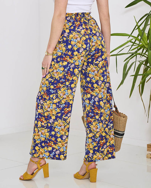Naiste sinised palazzo püksid tumesiniste lilledega- Rõivad