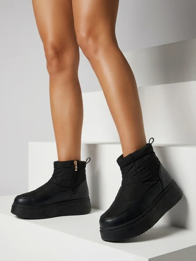 Royalfashion Women's slip-on snow boots in black Armeda