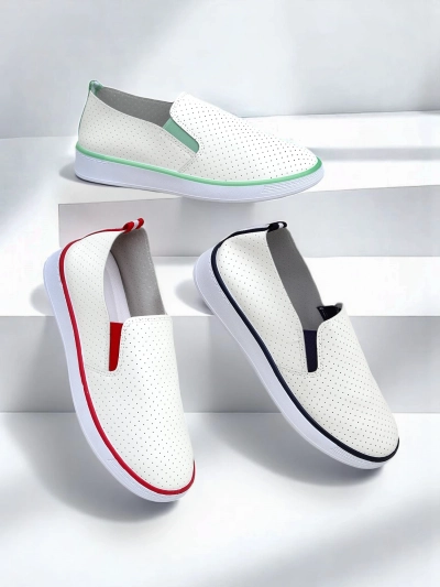 Royalfashion Naiste perforatsiooniga spordijalatsid Musio