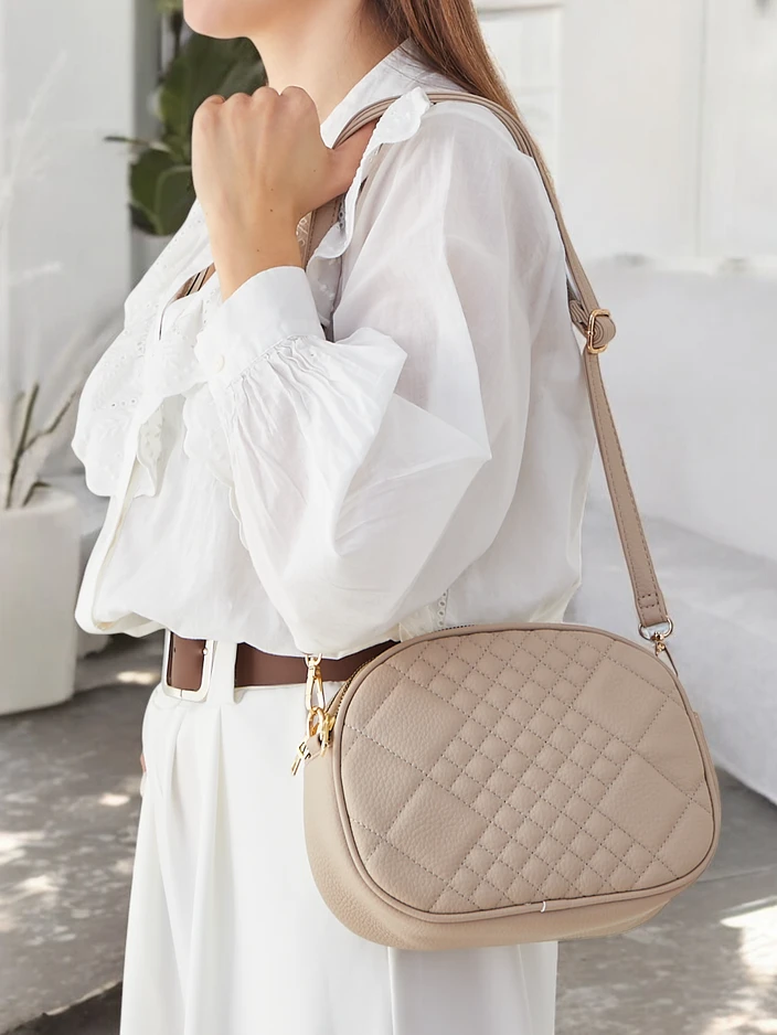 Royalfashion Oval small women's handbag made of eco-leather