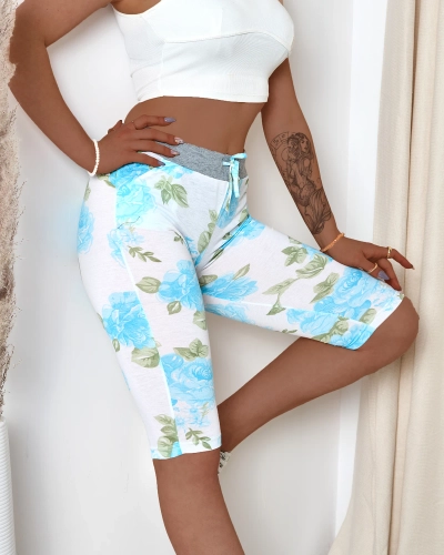 Naiste valged 3/4 pikkused sinililledega lühikesed püksid - Riietus