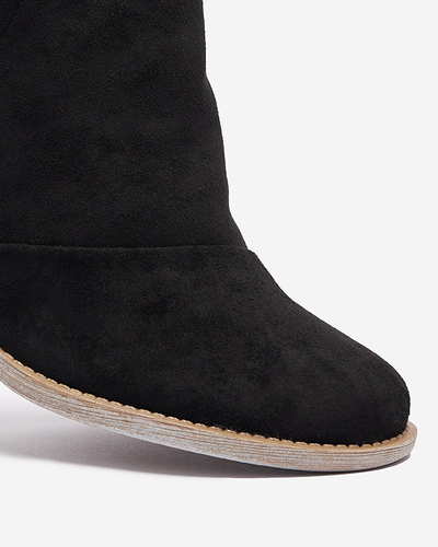 Black women's insulated boots on a brown Karela post - Footwear