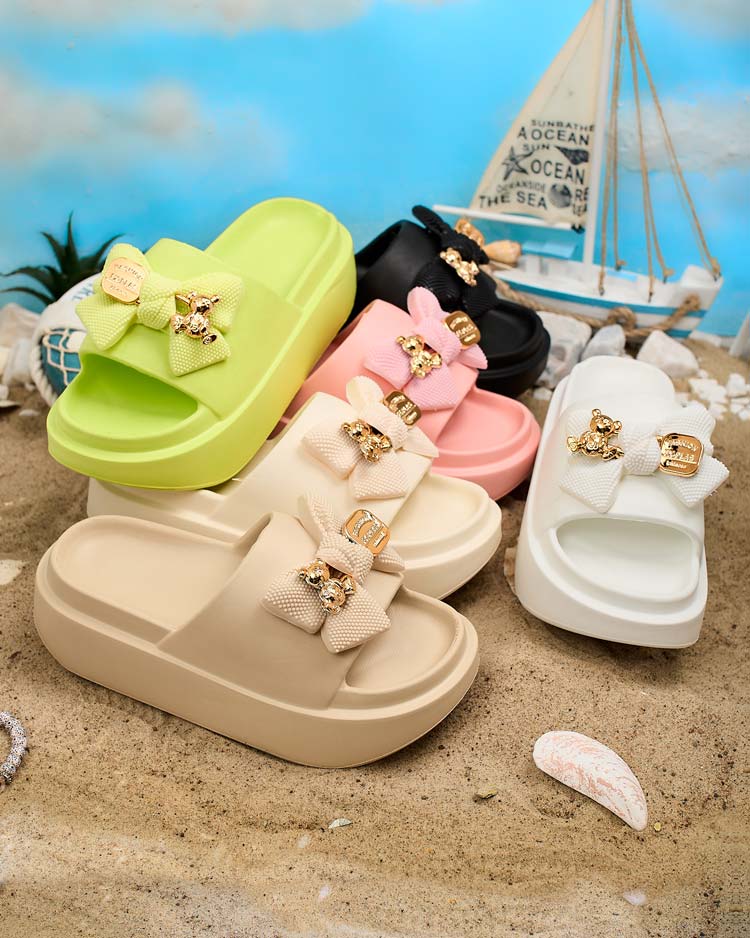 Royalfashion Naiste kummist flip-flopid dekoratiivse vibuga Nilm