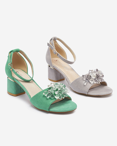 Green women's sandals on a post with decorative crystals Cerosso- Footwear