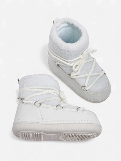 Naiste kasukaga saapad Uvella