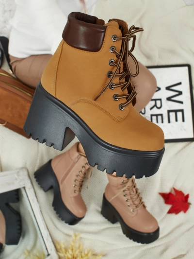 Naiste öko-seemisnahast poolsaapad Tavlissa, platvormi ja paksu kontsaga.