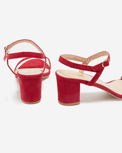 Red Usopi women's sandals on a post - Footwear