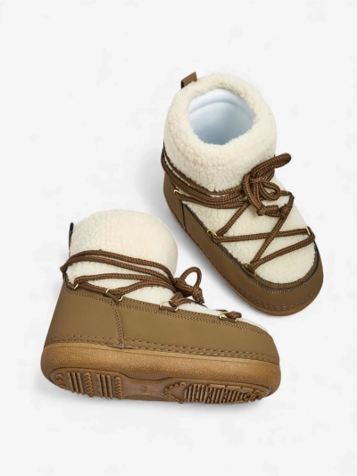 Naiste kasukaga saapad Uvella