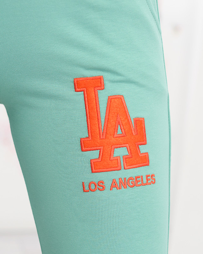 Women's green sweatpants with a colored patch - Clothing