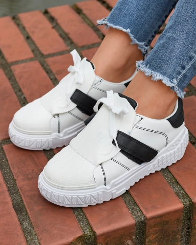 Mustad ja valged naiste spordijalatsid kummist sisetaldadega Inika - Jalatsid