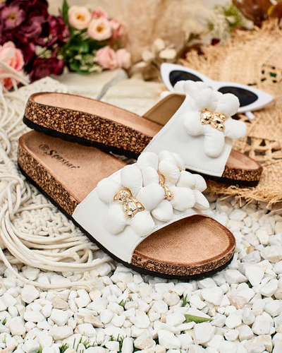 Royalfashion Naiste flip-flops kuldsete karude ja lilledega Isaralle